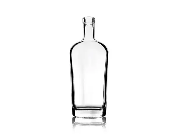 Industrial liquid filling equipment precisely dispensing product into glass bottles